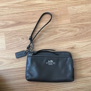 Coach clutch handbag. Muted brown color. In great condition.